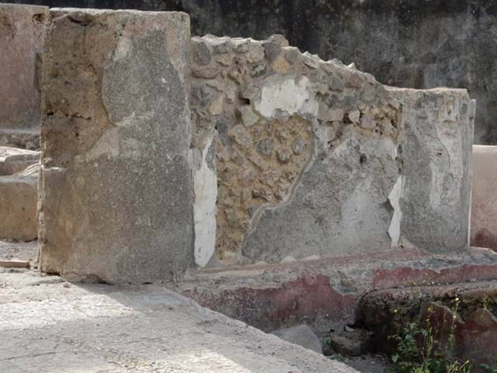Tempio dionisiaco in località Sant’Abbondio di Pompei. May 2018. Columns and plaster on south end of west wall.
Photo courtesy of Buzz Ferebee.
