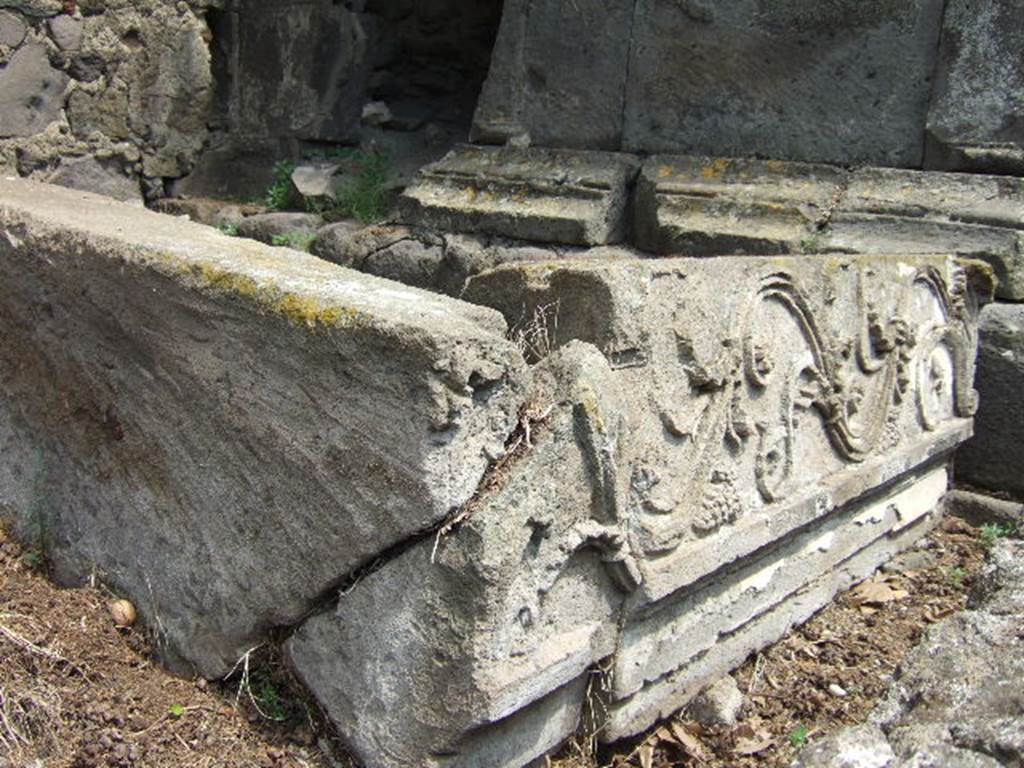 HGE06 Pompeii. May 2006. Tomb top frieze. This would have stood on columns on top of the current tomb remains forming an aedicula style extra level. See Kockel V., 1983. Die Grabbauten vor dem Herkulaner Tor in Pompeji. Mainz: von Zabern. (Abb 32-35).