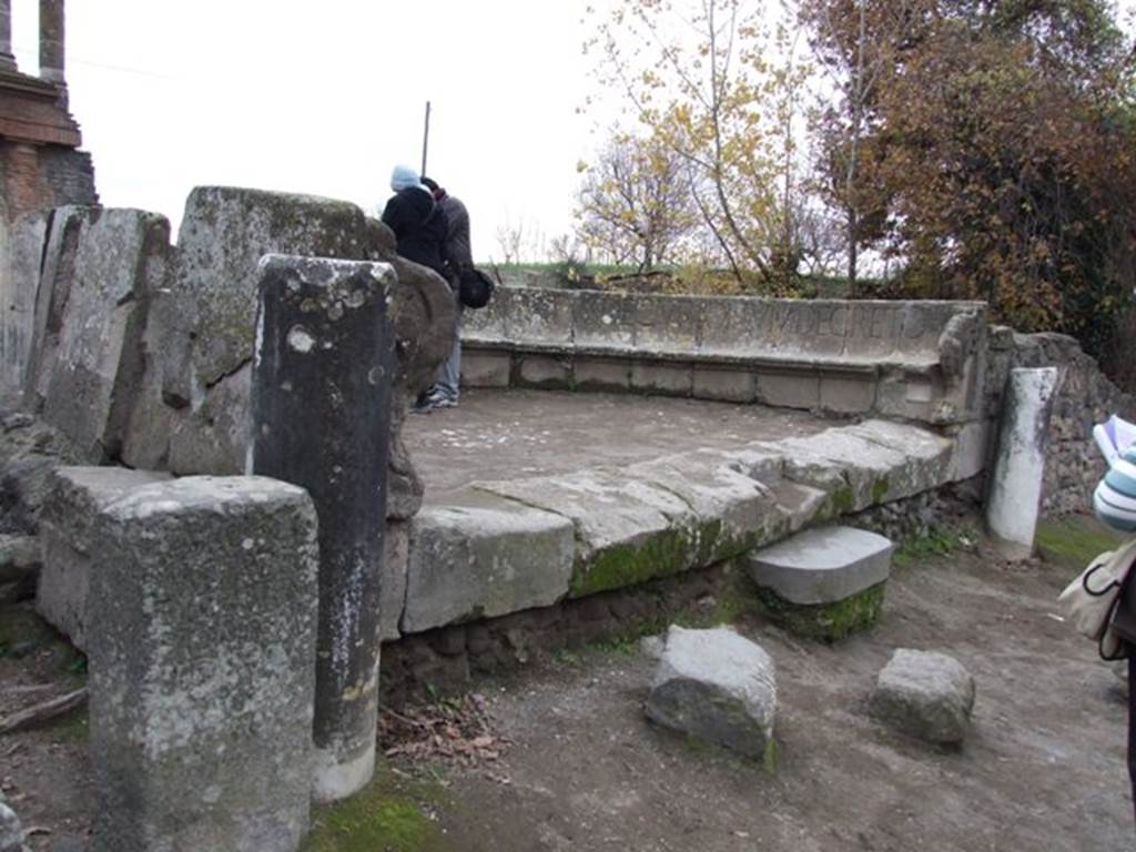 HGW03 Pompeii. December 2007. Remaining boundary stone at northern end of front. HGW03 boundary stone with inscription (lower stone on left) and HGW04, on the right. Two boundary stones were discovered on 21st September 1769, one at each corner of the front of the tomb. Both stones had identical inscriptions. Only one remains in situ. See Mau, A., 1907, translated by Kelsey F. W. Pompeii: Its Life and Art. New York: Macmillan. (p. 402)