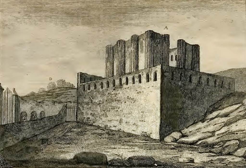 HGW04a Pompeii.  1777 drawing of tomb and masks by Sir William Hamilton. Hamilton gives the following descriptions:
A. View of a great sepulchre, or columbarium, out of the gates of the city: 
several marble statues, not very well executed, were found therein, which are now in the Museum at Portici.
B. Colossal masks of terra cotta, in the situation in which they were found.
C. C. Under them in vaults were found some sepulchral urns with ashes therein. 
One of the urns was of glass, with a cover of the same material; 
This urn was deposited in an earthen one, and that again covered with lead, which is now preserved in the Museum at Portici.
D. Uncleared parts of the city.
See Hamilton, W., 1777. Account of the Discoveries at Pompeii. London: Bowyer and Nichols. (p. 14, pl. IX).
