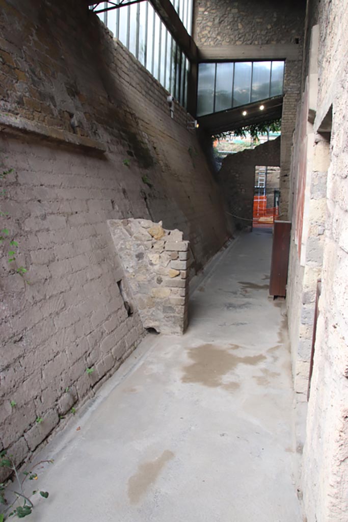 Villa of Poppaea, Oplontis, October 2023. 
Corridor on east side of south side of atrium, looking west from doorway to room 23, on right.
Photo courtesy of Klaus Heese. 
