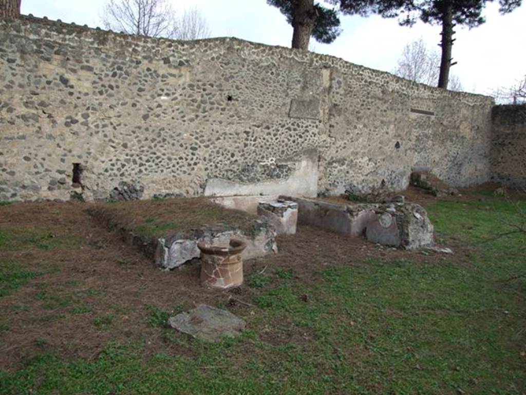 II.9.4 Pompeii. December 2007.  Garden area.  Stone triclinium.