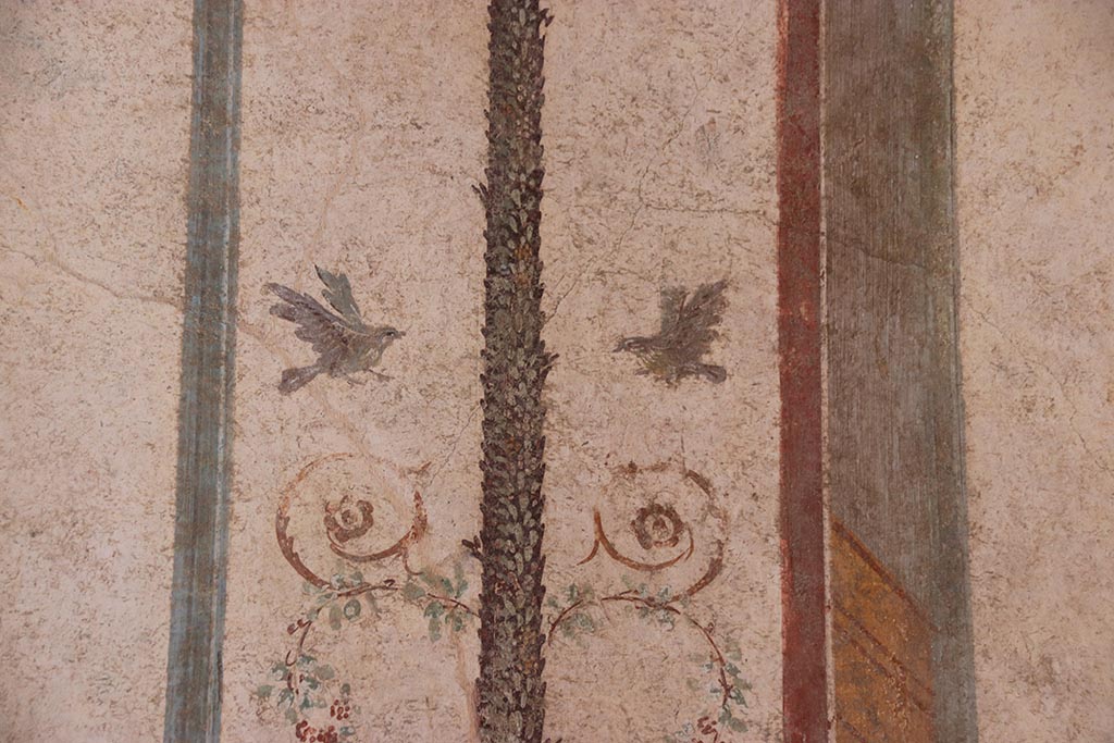 VI.15.1 Pompeii. October 2024. Cubiculum g, detail from painted candelabrum on west wall. Photo courtesy of Klaus Heese.