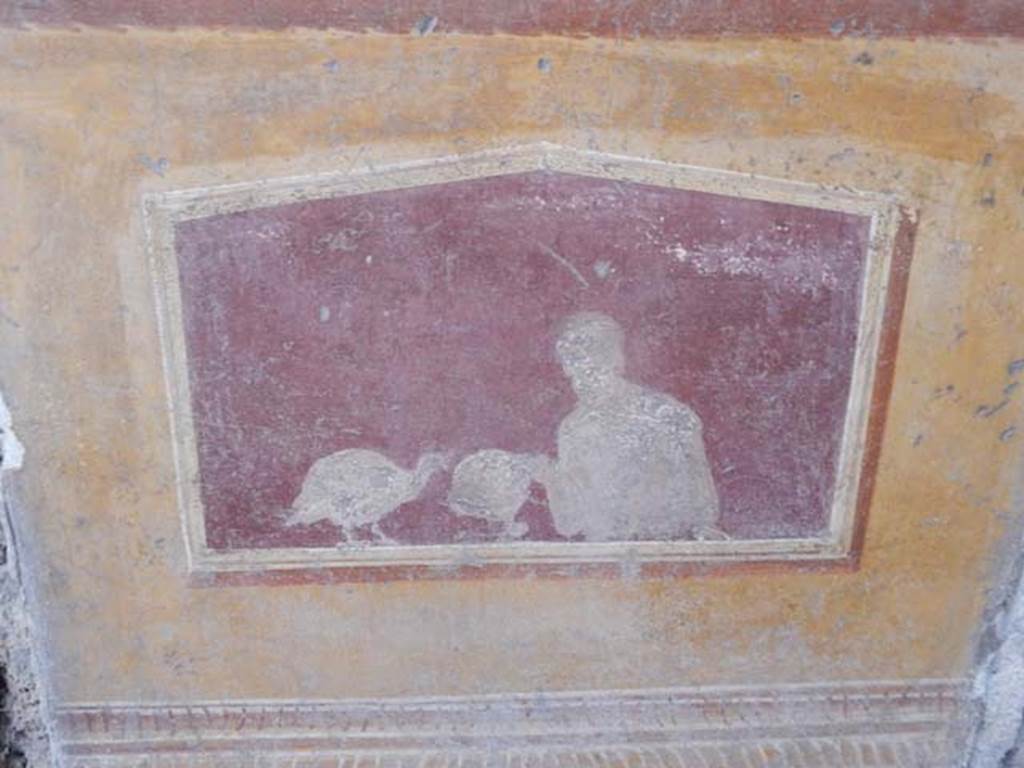 VI.15.1 Pompeii. May 2017.  Detail of painting in atrium between doorways to bedroom on left of main entrance and oecus on south side, after restoration.
Photo courtesy of Buzz Ferebee.
