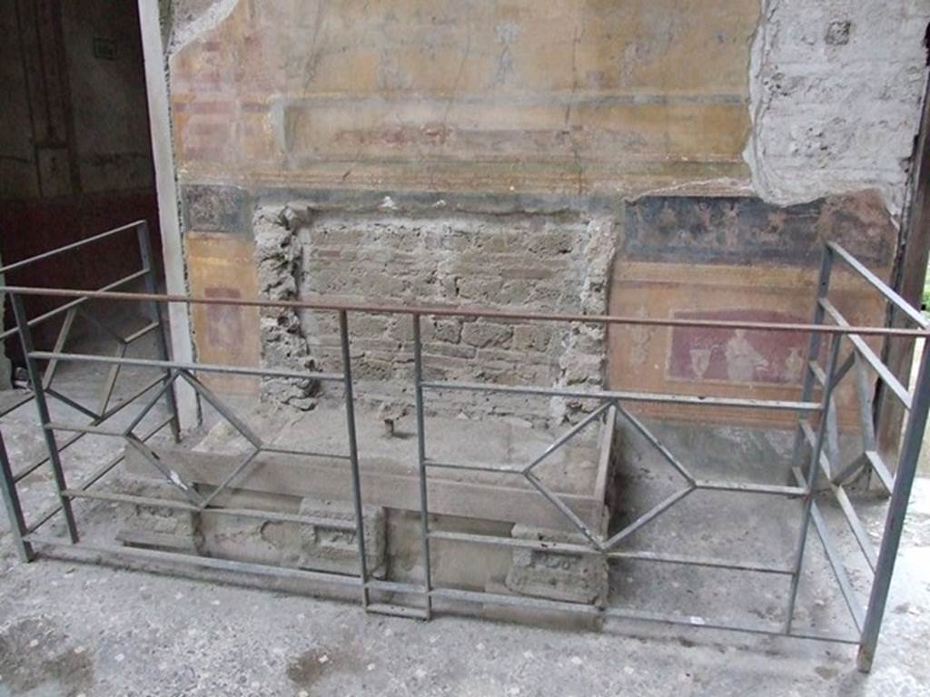 VI.15.1 Pompeii. December 2006. Looking towards north side of atrium.
The remains of a masonry base that would have supported an iron and bronze strongbox or safe. 
There were no remains of a strongbox.
