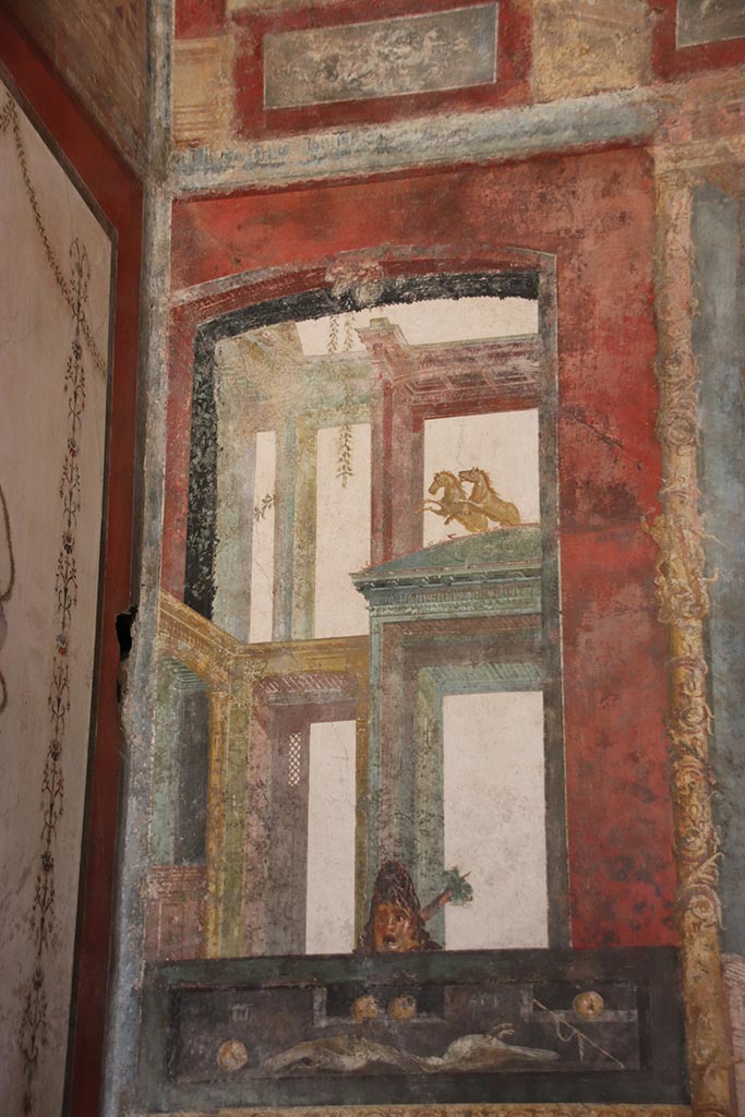 VI.15.1 Pompeii. October 2024. 
East wall at north end in exedra, painted panel with food. Photo courtesy of Klaus Heese.
