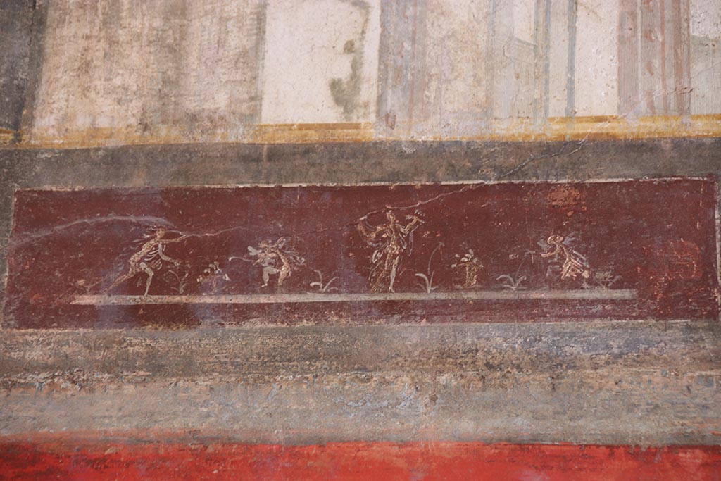 VI.15.1 Pompeii. October 2024. 
Upper south wall, detail of painted panel continuing from south-east corner. Photo courtesy of Klaus Heese.
