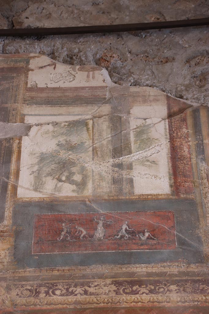 VI.15.1 Pompeii. October 2024. 
Upper south wall towards west end, painted panels. Photo courtesy of Klaus Heese.
