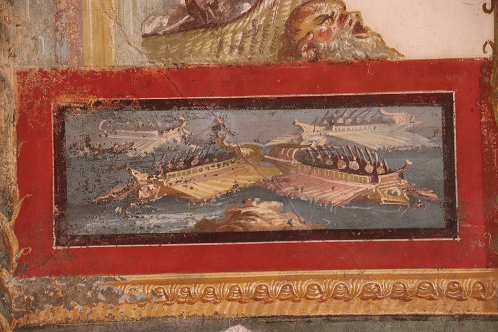 VI.15.1 Pompeii. October 2024. Painted panel of naval scene from south wall of exedra. Photo courtesy of Klaus Heese.