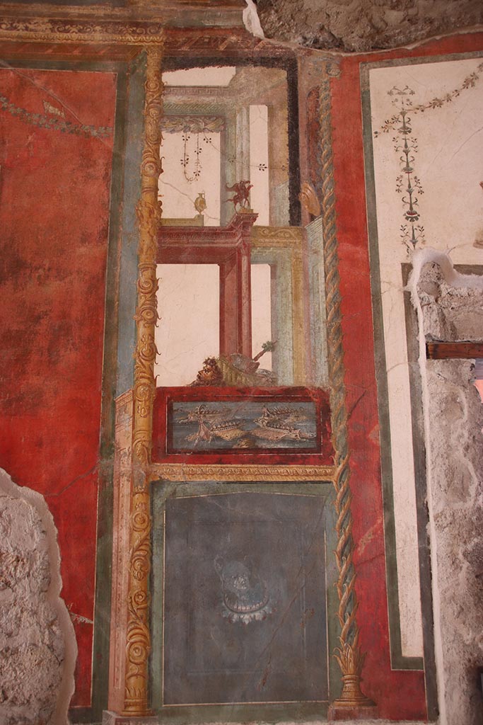 VI.15.1 Pompeii. October 2024. 
Painted panel on west side of central painting on south wall. Photo courtesy of Klaus Heese.
