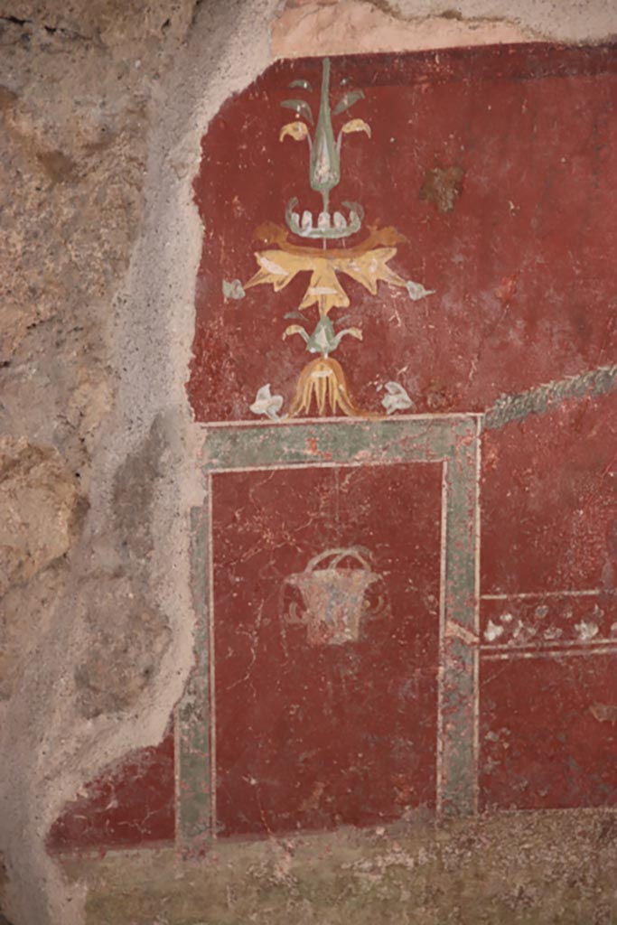 VI.15.1 Pompeii. October 2023. 
Detail of zoccolo on lower north wall at west end. Photo courtesy of Klaus Heese.
