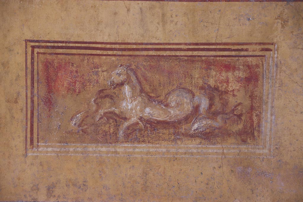 VI.15.1 Pompeii. October 2024. Painting of sea horse in exedra on north wall. Photo courtesy of Klaus Heese.