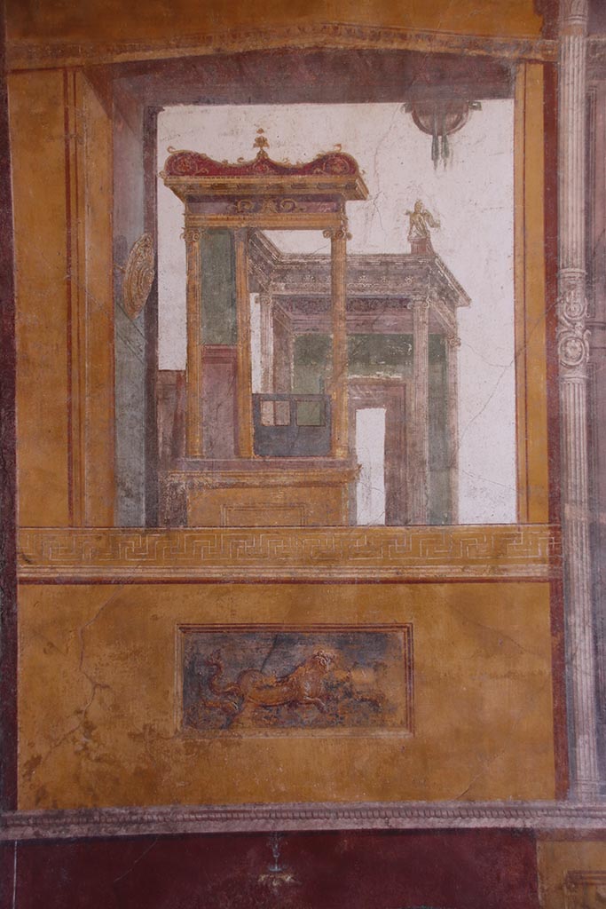 VI.15.1 Pompeii. October 2024. 
Architectural wall painting on south wall at east end in south-east corner of exedra.
Photo courtesy of Klaus Heese.

