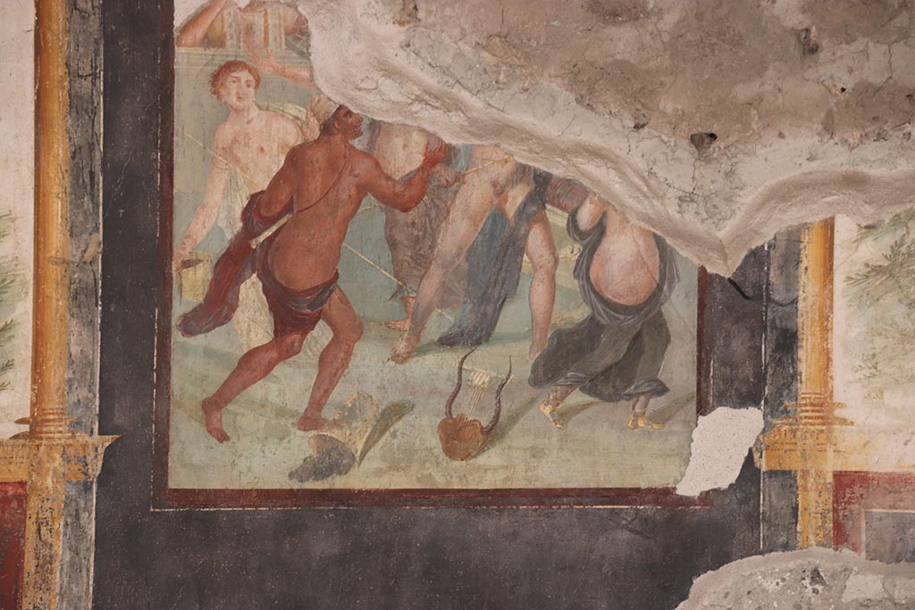 VI.15.1 Pompeii. October 2024. Triclinium “t”, detail of central painting on east wall. Photo courtesy of Klaus Heese.