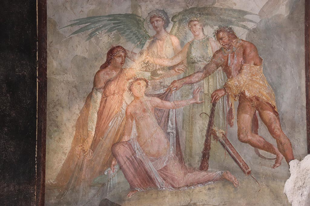 VI.15.1 Pompeii. October 2024. 
Triclinium “t”, detail of central painting of Hercules and Auge from south wall. Photo courtesy of Klaus Heese.
