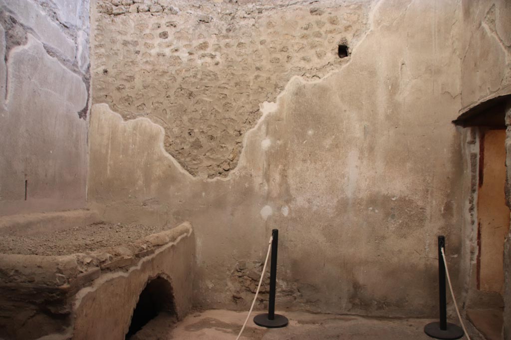 VI.15.1 Pompeii. October 2023. Looking towards west wall in kitchen (w). Photo courtesy of Klaus Heese.