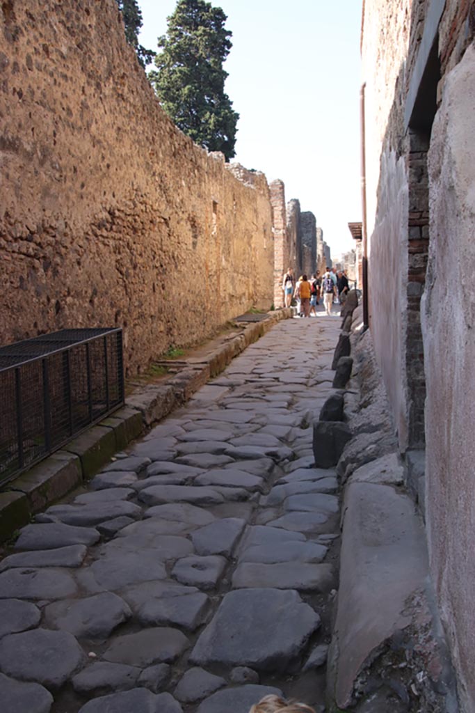 VI.15.27 Pompeii. October 2023. 
Looking west on Vicolo di Mercurio from entrance doorway. Photo courtesy of Klaus Heese.
