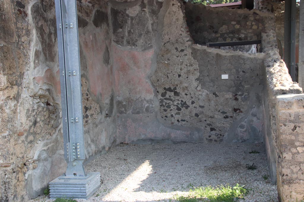 HGW24 Pompeii. Villa of Diomedes. October 2023. 
Looking towards south-east corner with remaining painted stucco. Photo courtesy of Klaus Heese.
