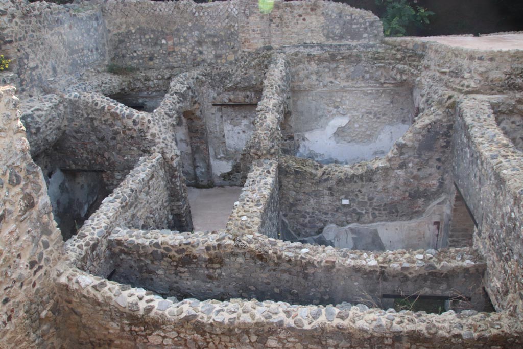 HGW24 Pompeii. Villa of Diomedes. October 2023. 
Looking from south end of terrace A down onto rooms at south end. Photo courtesy of Klaus Heese.
On the left - stairs to lower level.
(Villa Diomedes Project – area 47 stairs on left, area 51 in centre, 46 at rear of 51, and 52, on right
(Fontaine, room (stairs, on left), room 5,1, (with 5a at top), and room 5,4 centre right. Corridor 5,3 lower edge).
