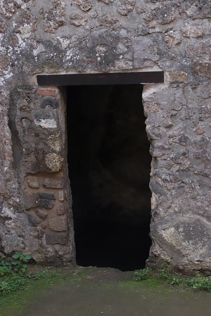 HGW24 Pompeii. Villa of Diomedes. October 2023. 
Doorway to room 5,17 in west wall of room 5,18. Photo courtesy of Klaus Heese.
