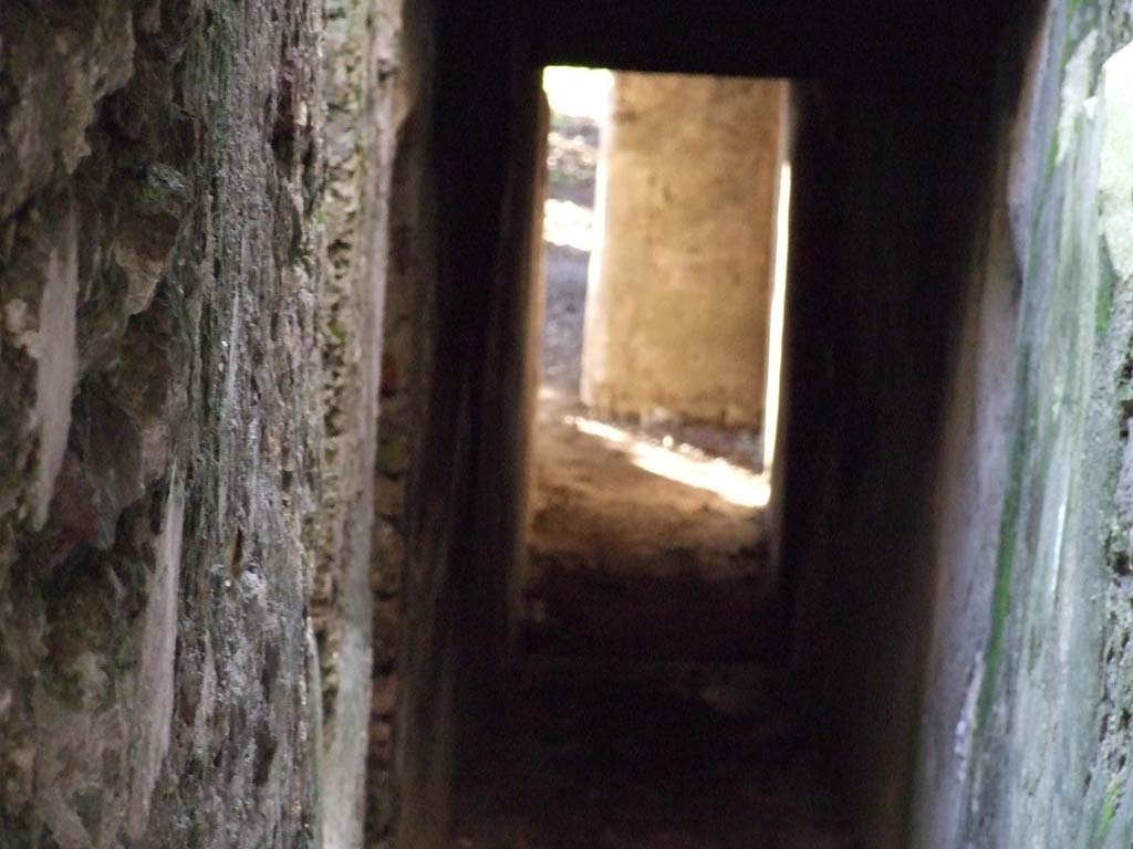 HGW24 Pompeii. December 2006. 
Corridor down to lower level. No.36 on the La Vega plan was found in the room with the doorway in the left wall.
(Villa Diomedes Project – area 62, with doorways to area 64, on left).
(Fontaine, rooms 5,14/5,15 on south side of corridor leading from upper to lower floor).
