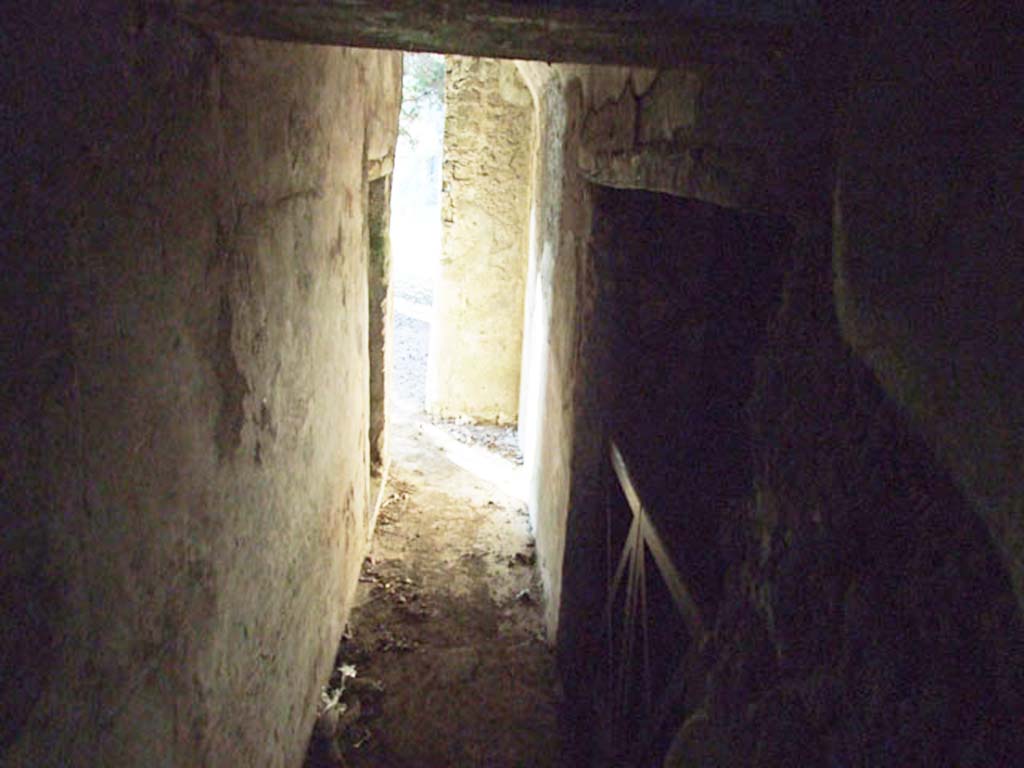 HGW24 Pompeii. December 2006. Corridor down to lower level, with doorway to two rooms, on right. 
(Fontaine, room 6a, and 6b).
