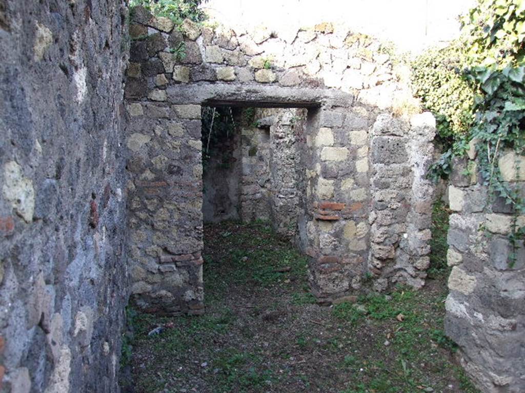 HGE12 Pompeii. December 2006. Doorway to room on north side, in north-east corner of Villa.