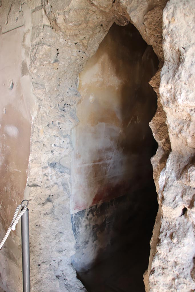 Villa San Marco, Stabiae, October 2022. 
Room 26, looking north through gaping hole, made by 18th century tunnelling, in south wall of kitchen.
Photo courtesy of Klaus Heese.
