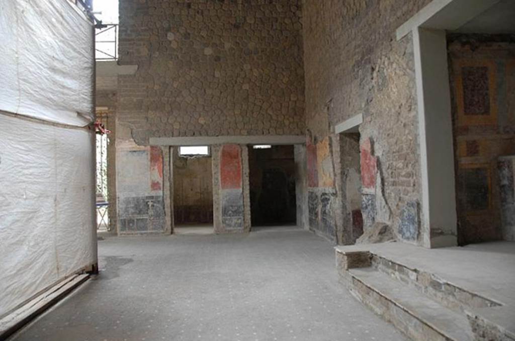 Castellammare di Stabia, Villa San Marco, January 2011. Room 44, looking south across west side of atrium towards doorways to rooms 57, and 49. The doorway to room 52 can be seen on the right of centre. The steps leading to the lararium are on the right. Photo by Nando Calabrese.

