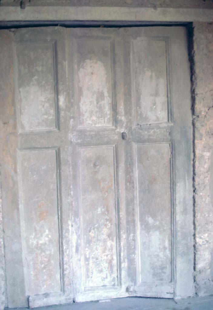 Villa dei Misteri, Pompeii. August 1976. Room 17, procoeton or anteroom.
Looking south towards the plaster cast of closed shutters of room 16, cubiculum.
Photo courtesy of Rick Bauer, from Dr George Fay’s slides collection.
