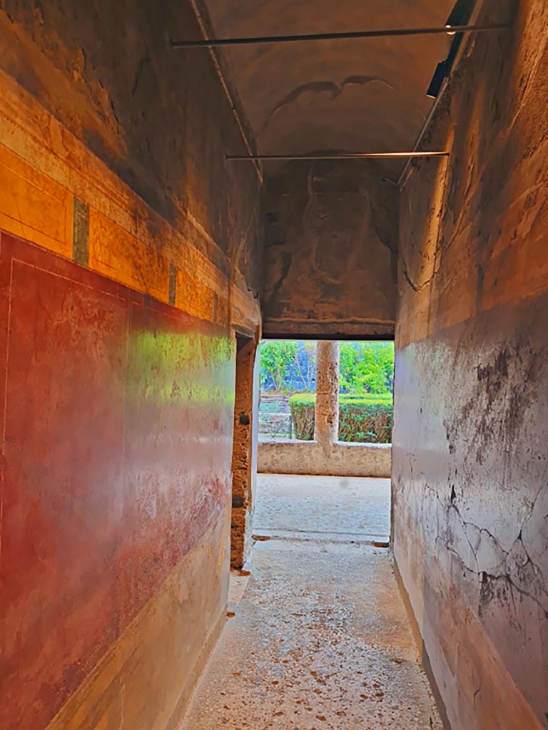 Villa of Mysteries, Pompeii. November 2023. 
Corridor F1, looking south towards Portico P1. Photo courtesy of Giuseppe Ciaramella.
