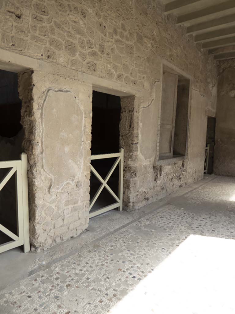 Villa of Mysteries, Pompeii. September 2017. 
Looking south along portico P3, with doorways to rooms 13, 12, and window of room 11.
Foto Annette Haug, ERC Grant 681269 DÉCOR.
