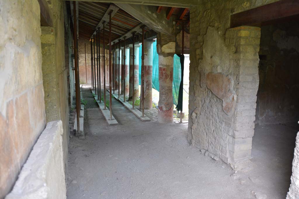 Villa Regina, Boscoreale. April 2017. 
Looking north through entrance doorway XIV towards west side of portico VII, with doorway to room X, on right. 
Photo courtesy of Adrian Hielscher.

