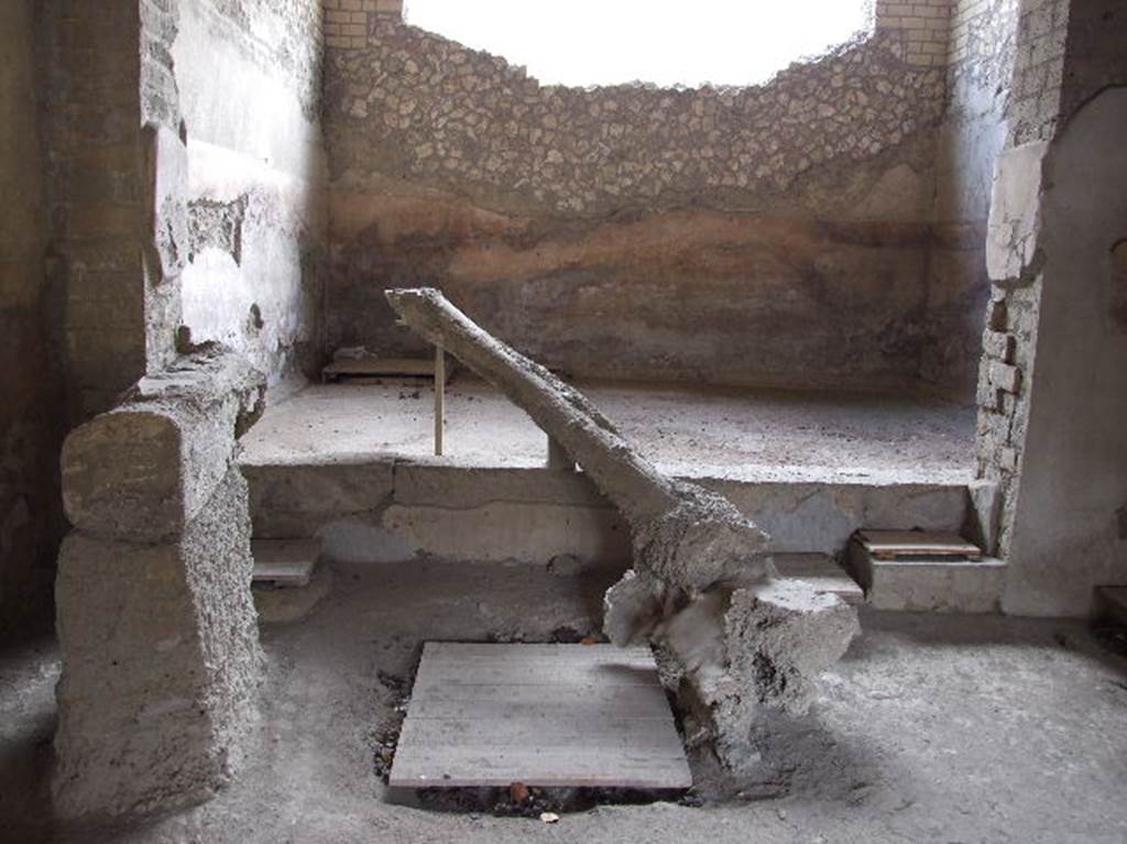 Villa Regina, Boscoreale. December 2006. 
Looking west across room IX, calcatorium at the front, towards room IXbis, torcularium at the rear.
The calcatorium is the area where grapes were trodden prior to a final pressing with the torcularium or wine press.
