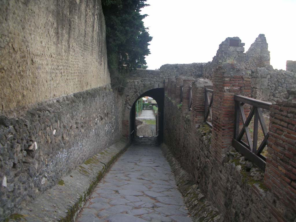 Via Marina, Pompeii. May 2011. 
Looking west through Porta Marina from between VIII.1 and VII.16. Photo courtesy of Ivo van der Graaff.

