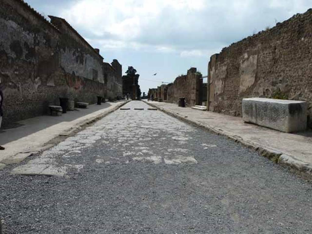 Via Marina, May 2010. Looking west between VIII.1 and VII.7.32 the Temple of Apollo.